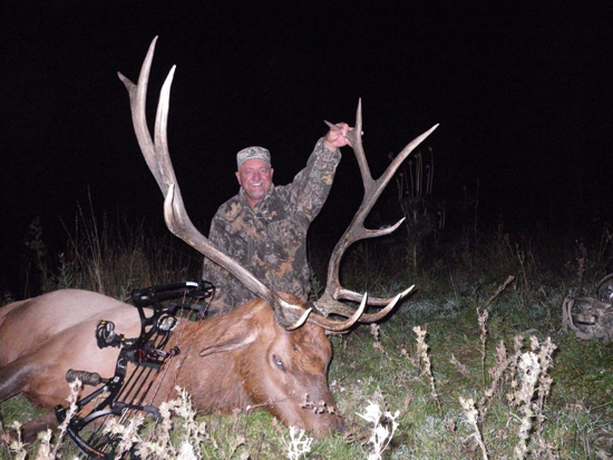 Billy Moore with bull 
	  Elk he shot in CO with his bow.